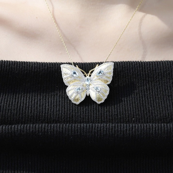 Pendant and Butterfly Brooch in 925 Silver and Topaz